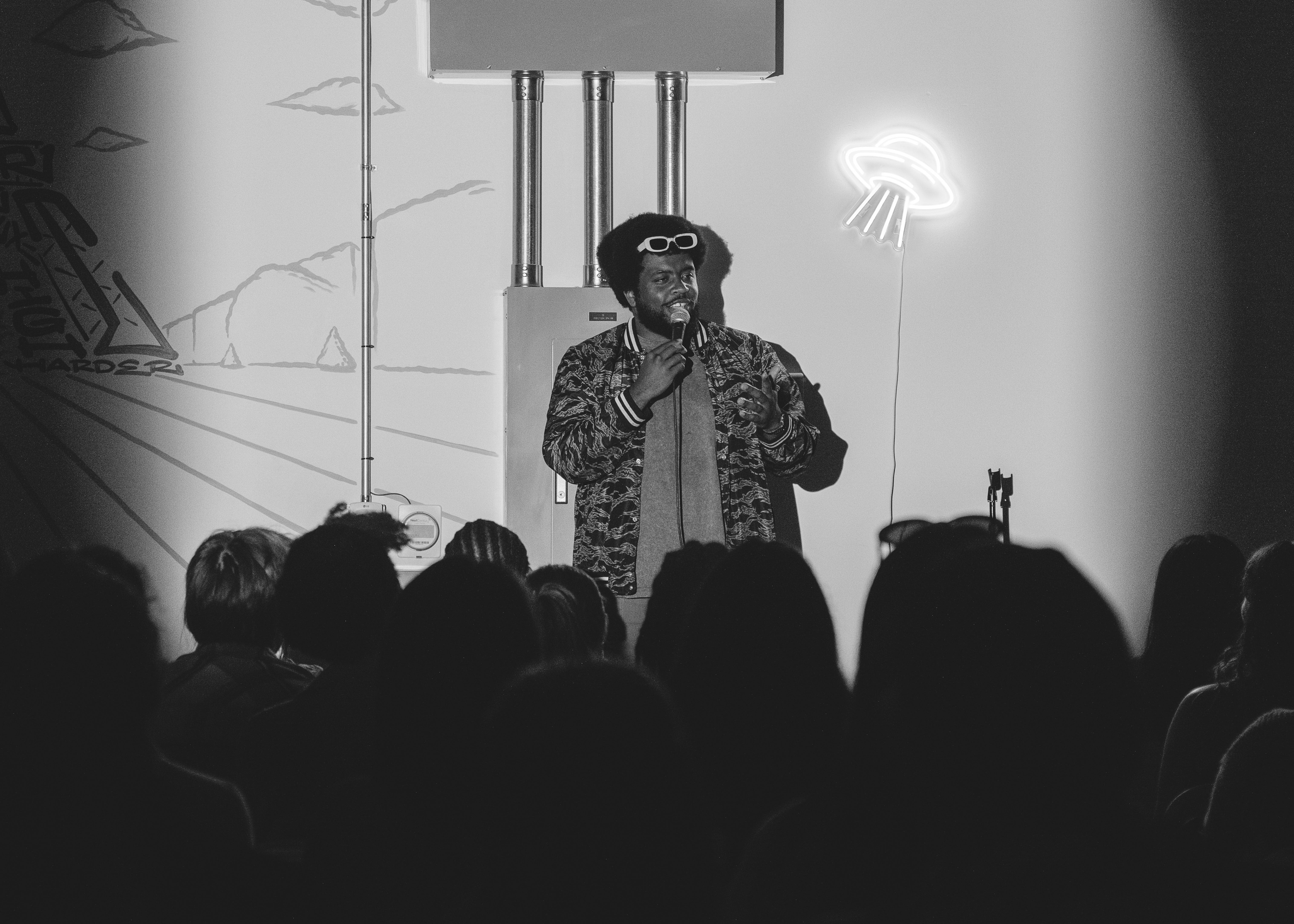 Comedian on stage at Spaced Out Comedy San Jose